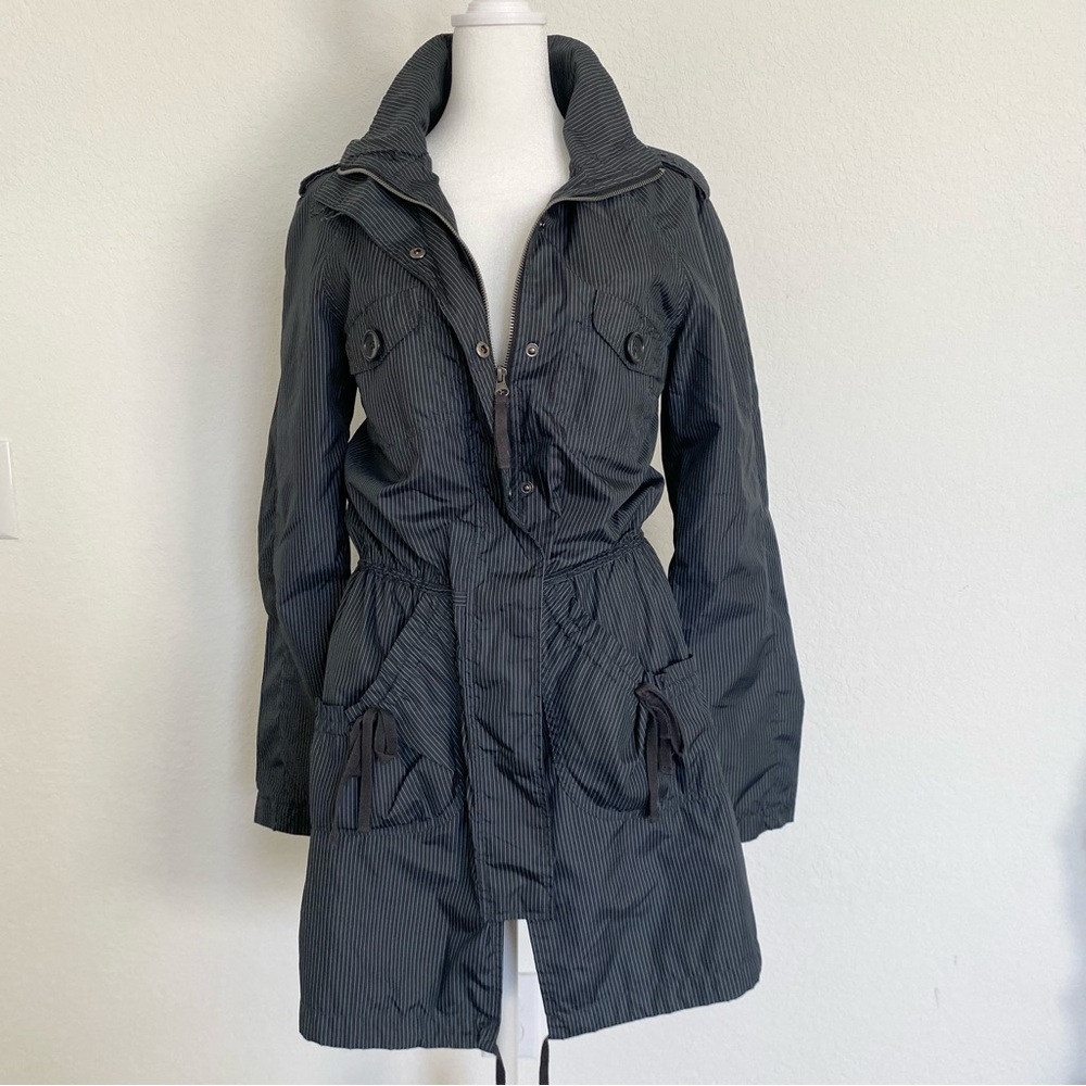 Black pinstripe windbreaker jacket with drawstring waist